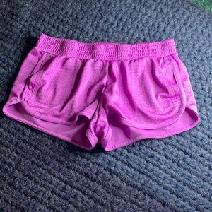 purple running shorts